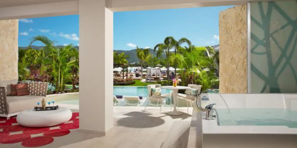 Private airport transfer arrival at Breathless Montego Bay Resort terrace view.