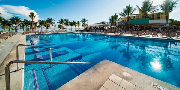 Large outdoor pool and sun deck at Hotel Riu Ocho Rios Jamaica.
