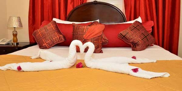 airport transfer to el greco resort montego bay bedroom